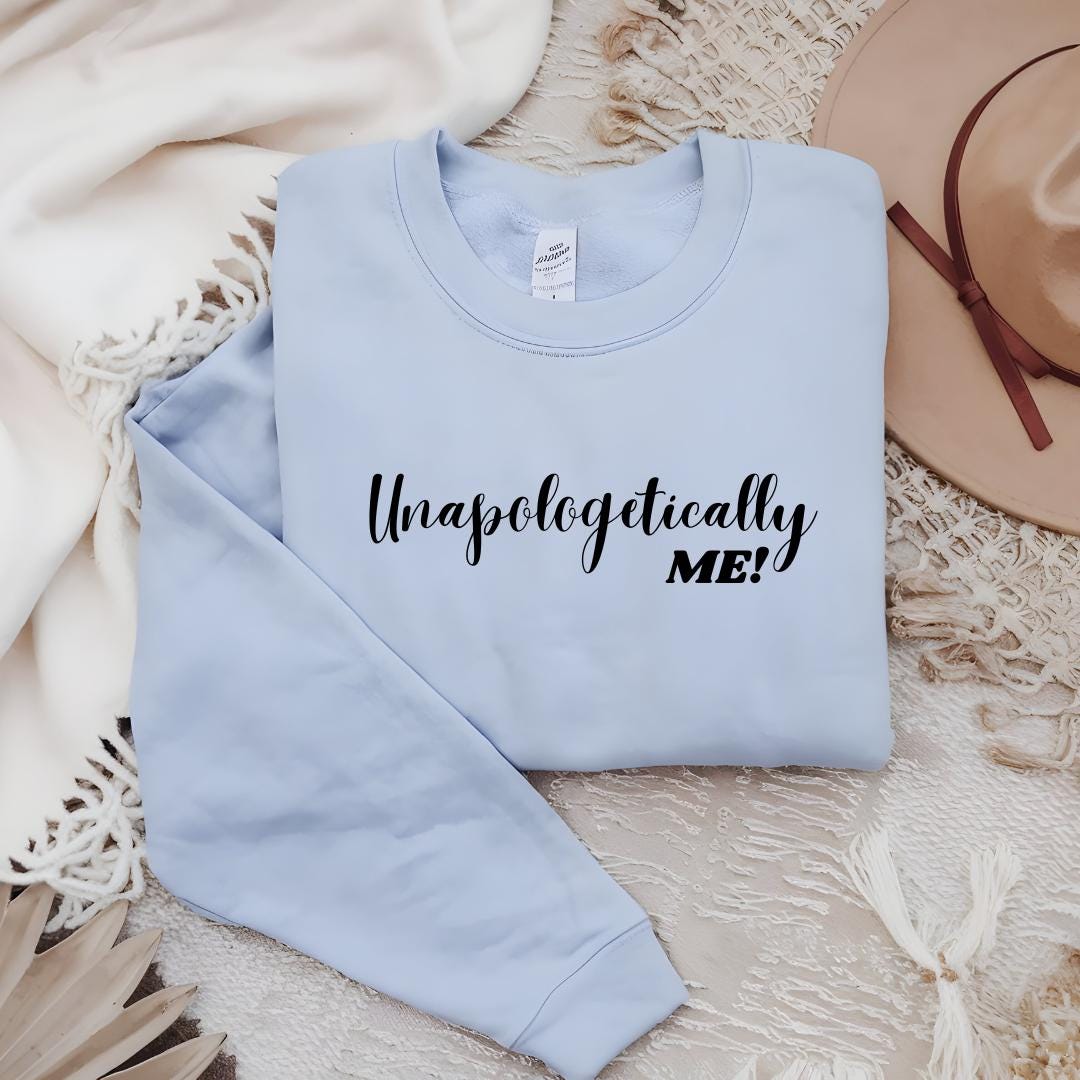 a light blue sweatshirt with the words unprontoally mem printed on it
