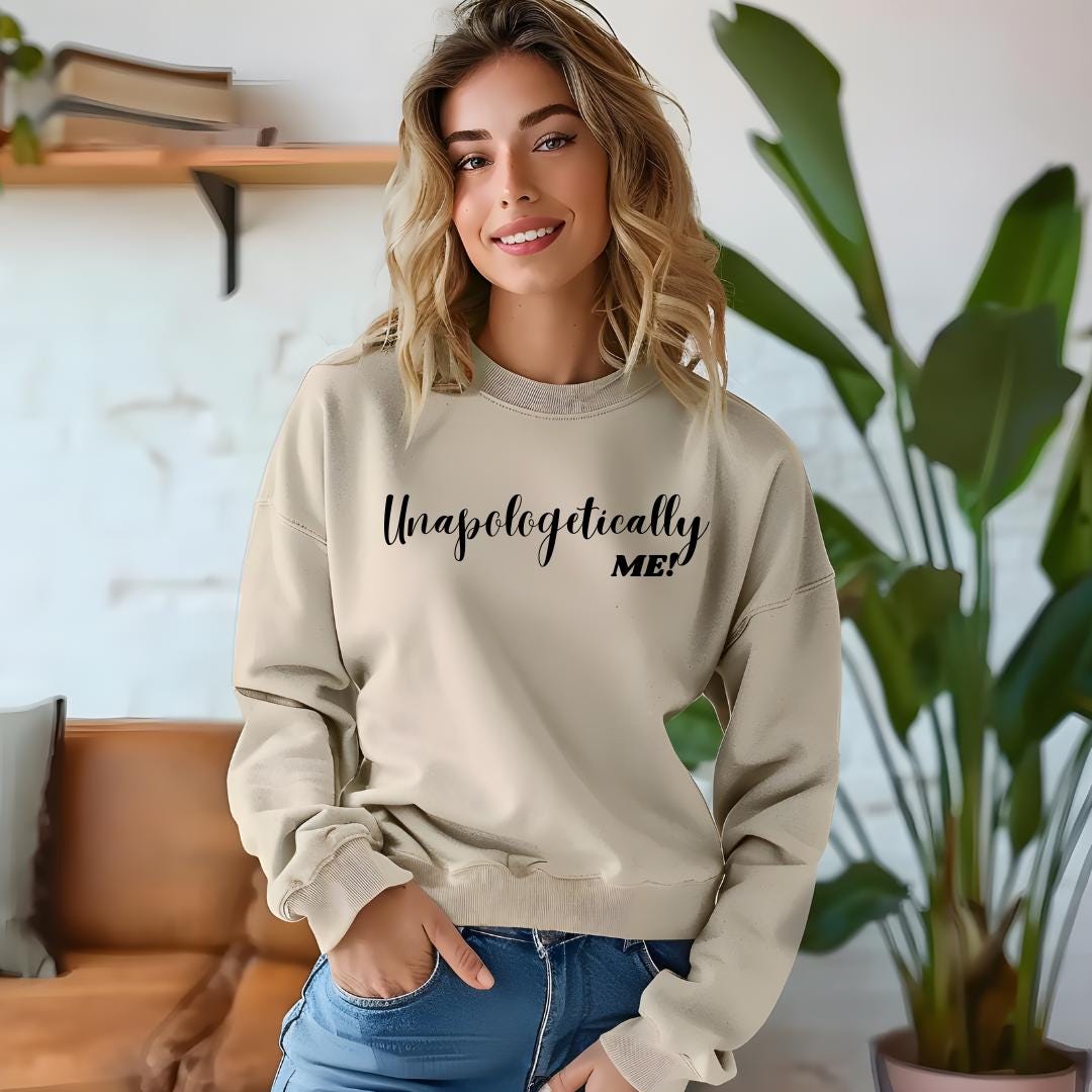 a woman wearing a sweatshirt with the words unapfetably met printed on it