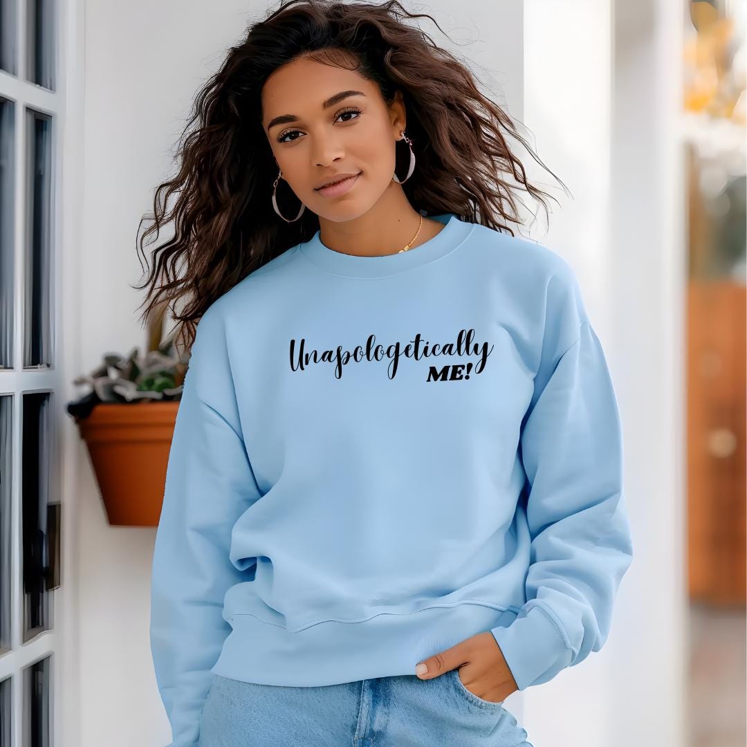 a woman wearing a blue sweatshirt that says, they're practically me